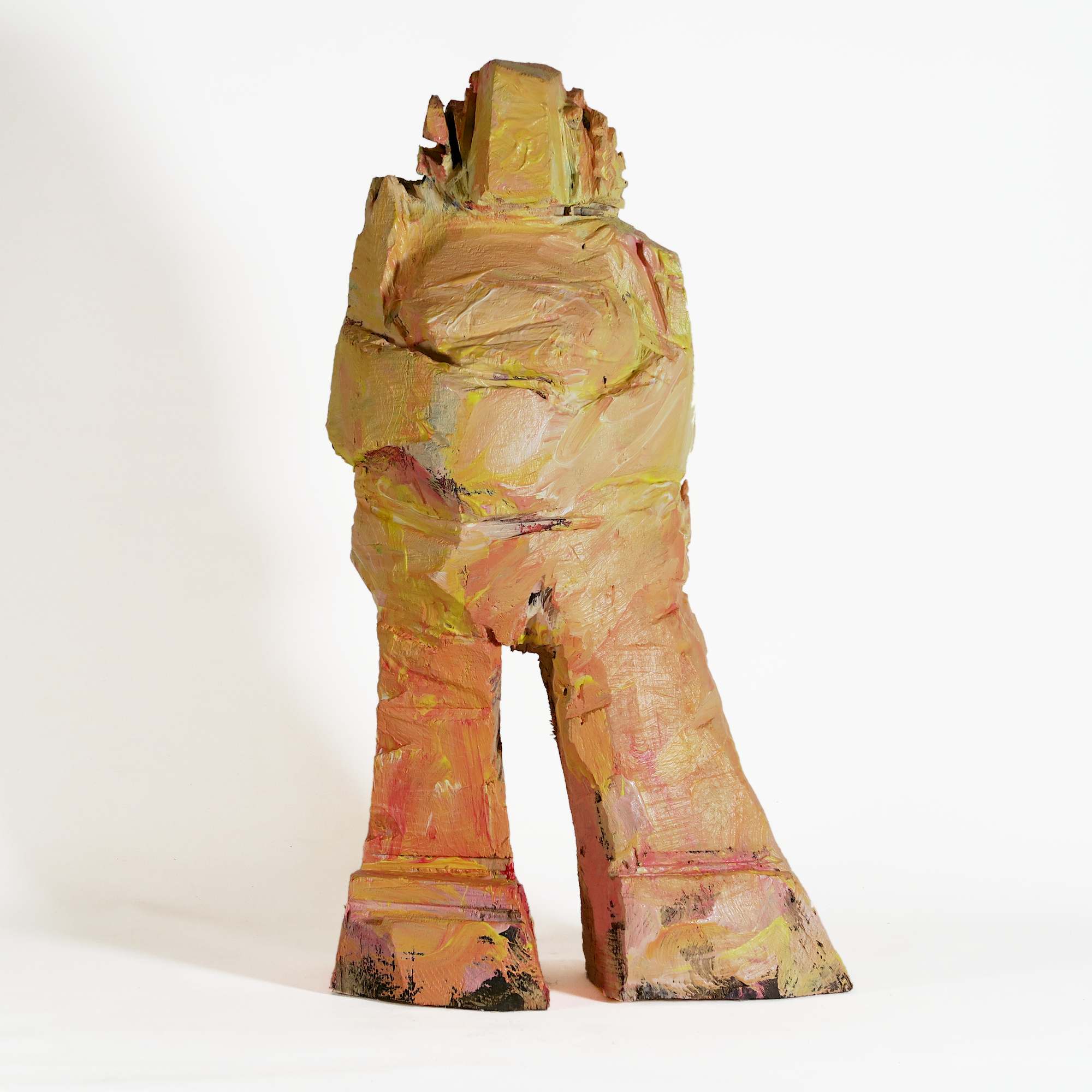 Geli - kleine Holzfigur mit der Kettensäge geschnitten und pastos gelb rot rosa bemalt